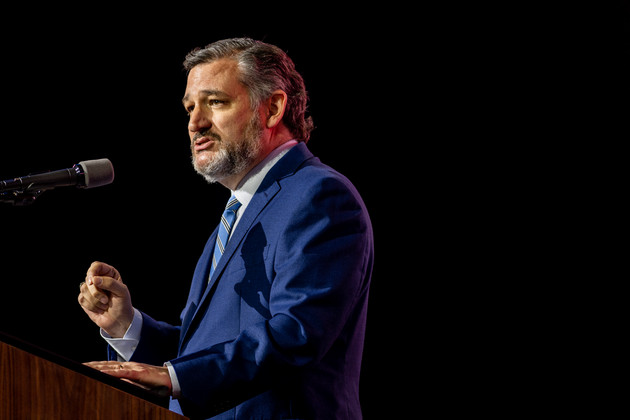 Ted Cruz speaks at a podium during an event.