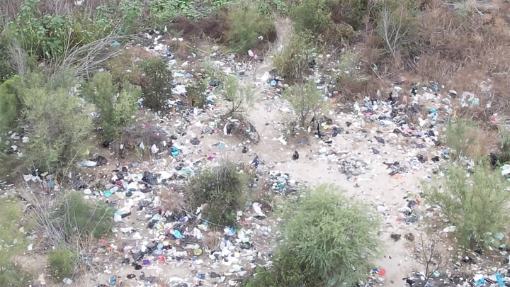Texas drone footage shows piles of trash and clothes at the southern border crossing