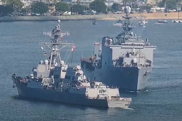 US Navy ships almost collide while traveling through San Diego Bay.
