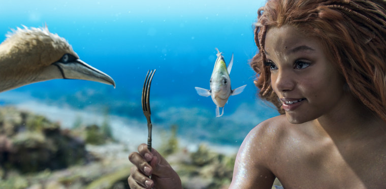Scuttle (voiced by Awkwafina), Flounder (voiced by Jacob Tremblay), and Halle Bailey as Ariel in Disney's live-action 