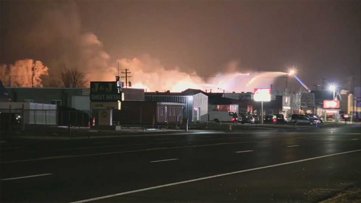 Firefighters tackling an industrial blaze