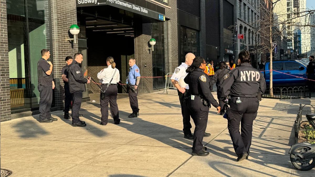 Police outside a subway station following a shooting
