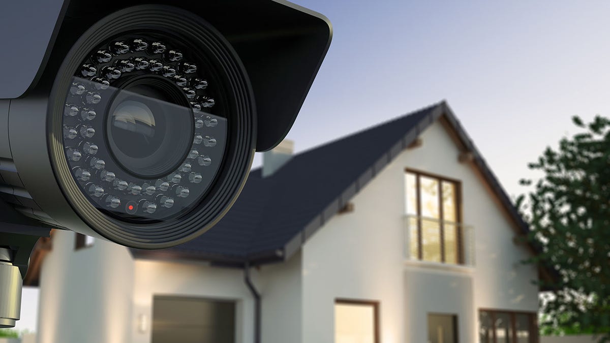 home security system, camera and a house